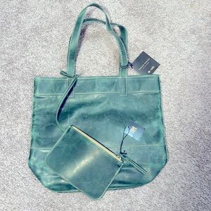 NWT. Discontinued.Frye leather tote with detachable wallet.